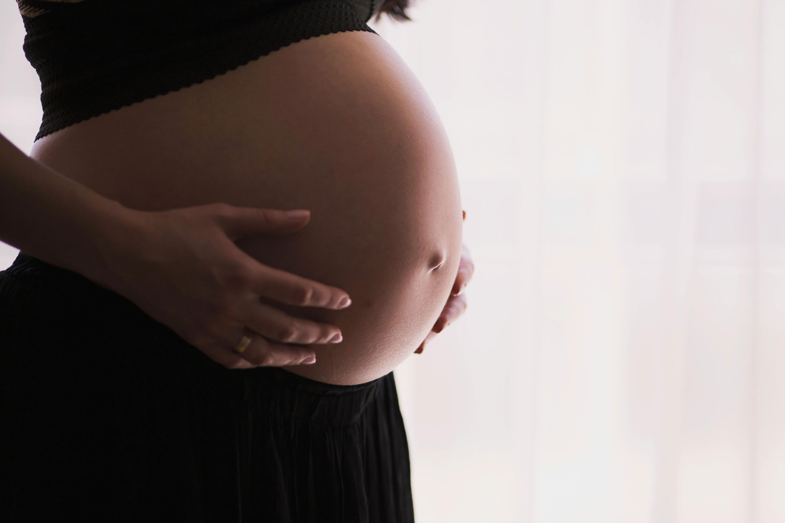 Person holding shoulder