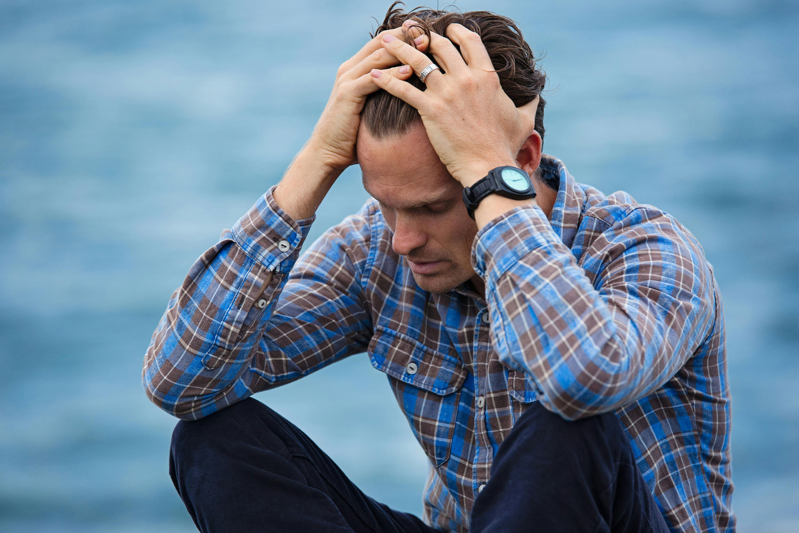 Person holding shoulder